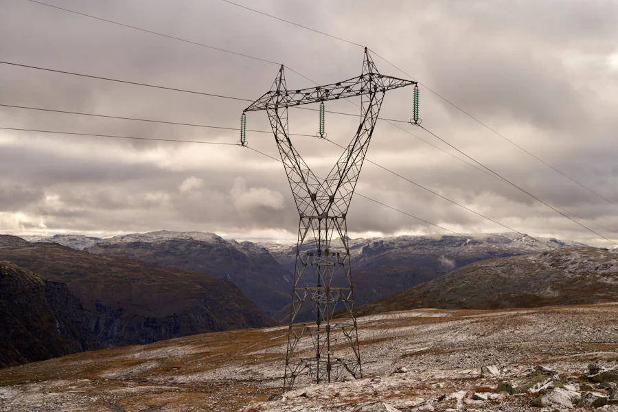High voltage power lines in mountain terrain