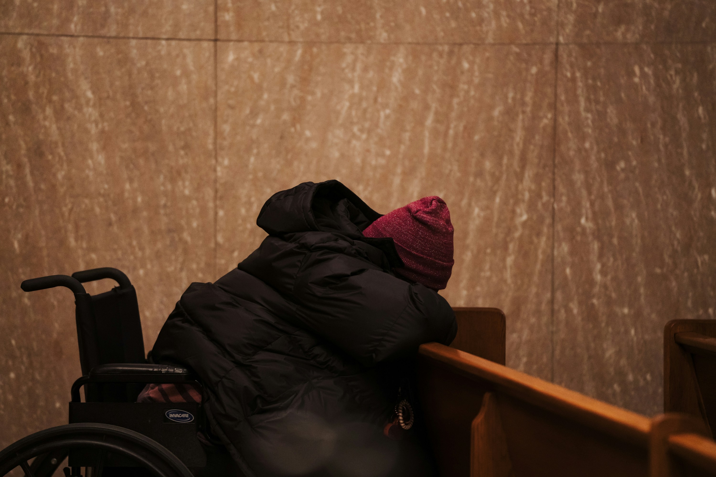 Person praying in church
