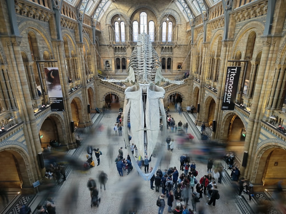 a large building with a huge statue in the middle of it