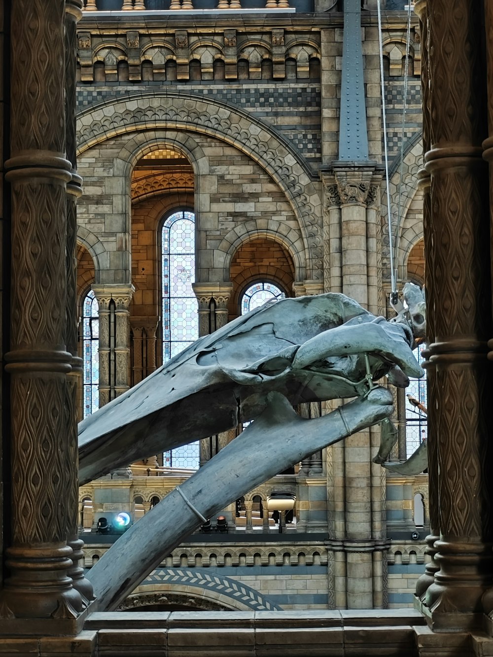 a statue of a dragon in a large building