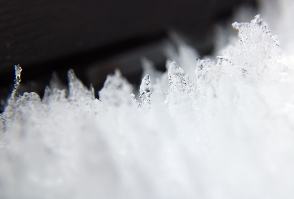 a close up of snow crystals on a table