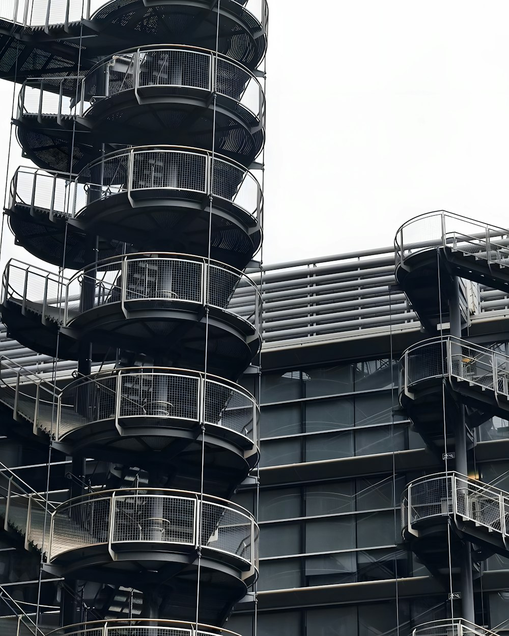 a very tall building with lots of balconies