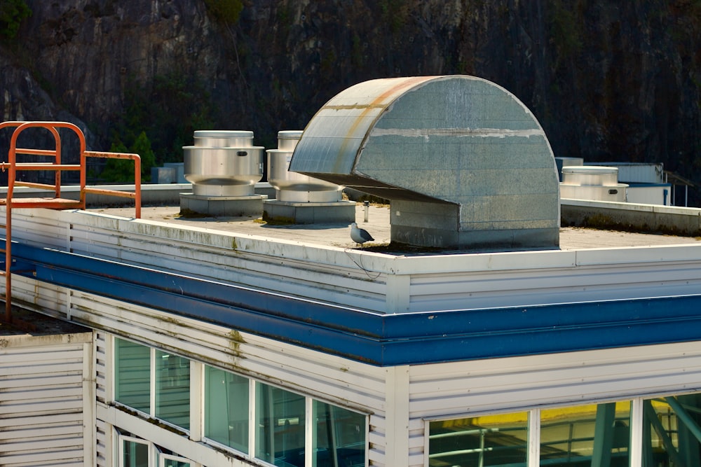 the roof of a building with a chimney on top of it