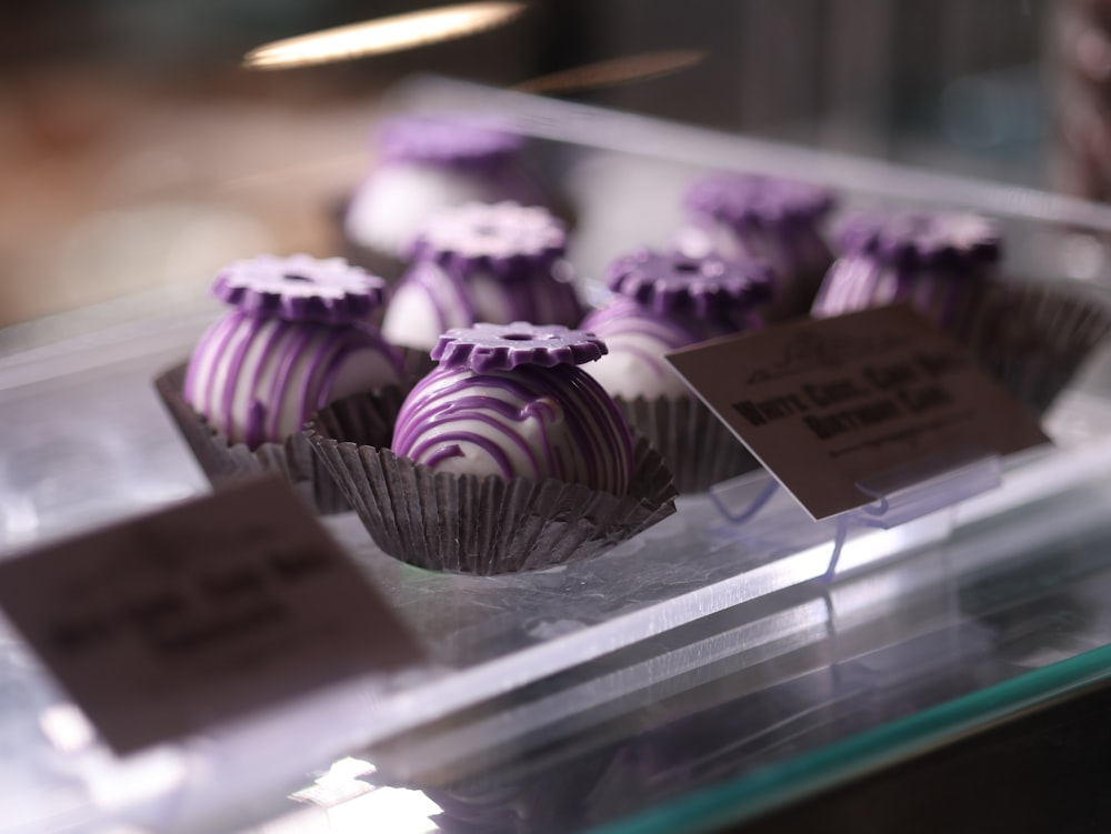 a close up of a tray of chocolates