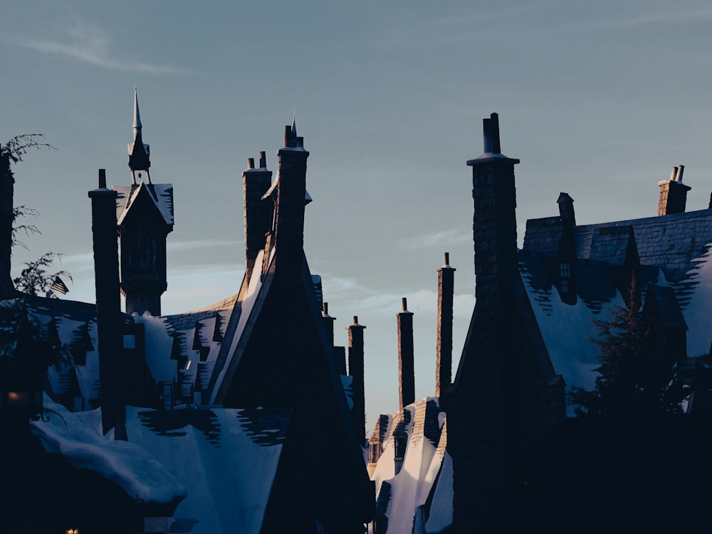 a view of a building with snow on the roof