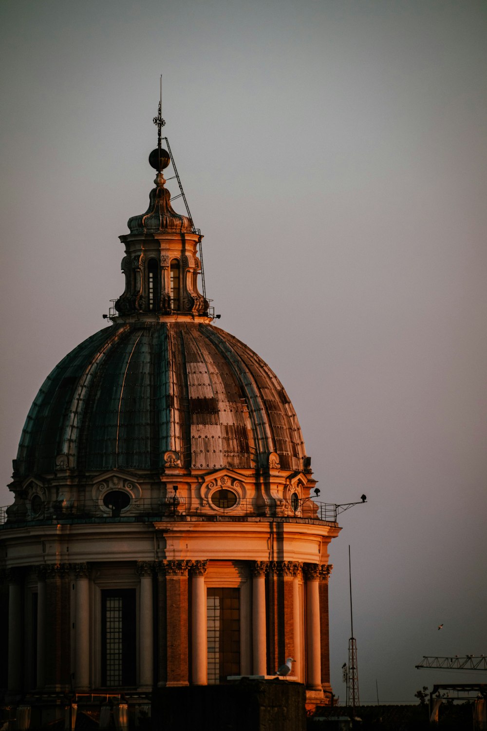 a large dome with a clock on top of it