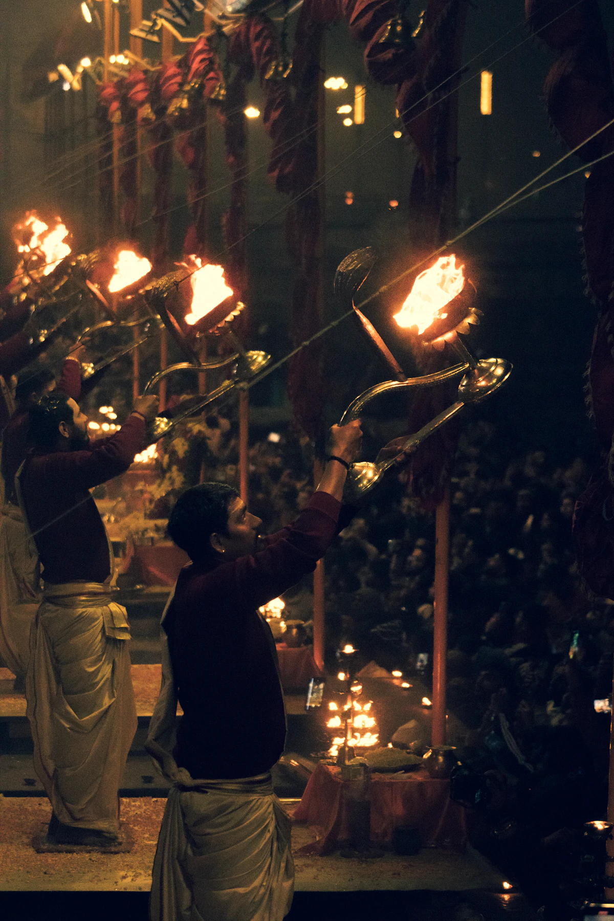 Priests performing the evening Ganga Aarti in Varanasi