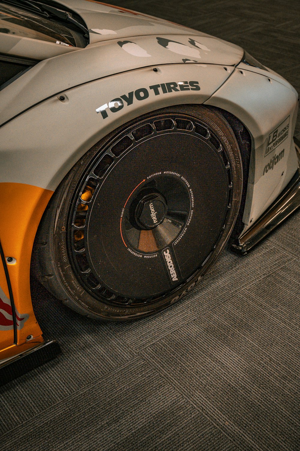 a close up of a tire on a race car