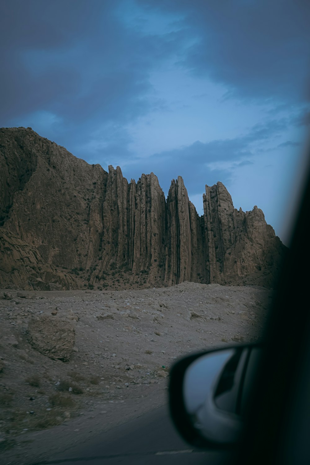 a view of a rocky outcropping in the desert