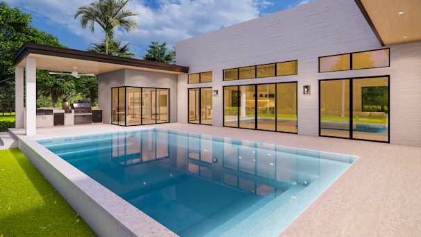 a modern house with a pool in the middle of the yard