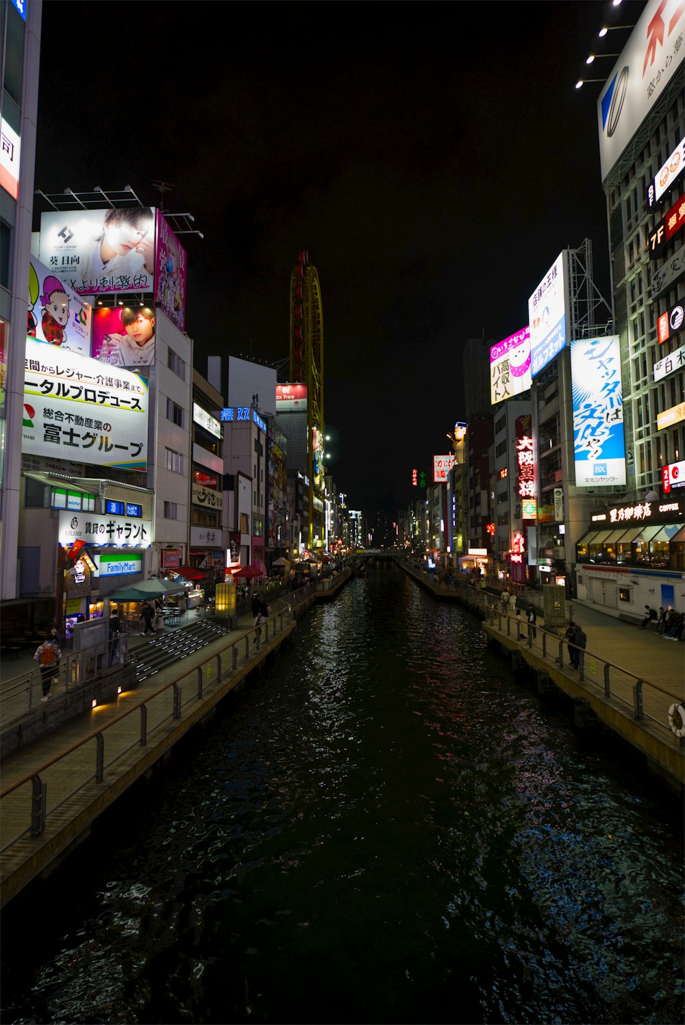 a river running through a city at night