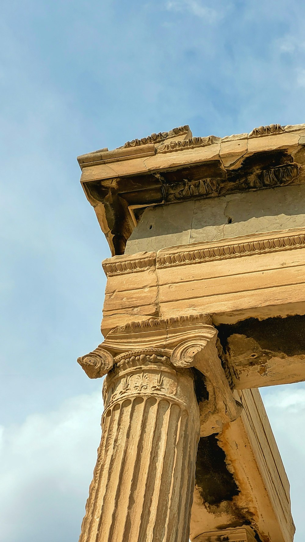 a close up of the top of an old building