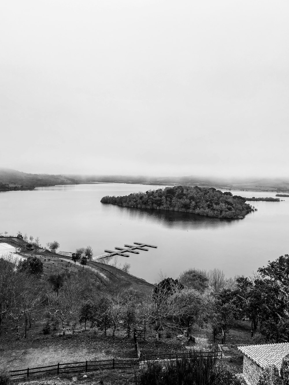 a black and white photo of a lake