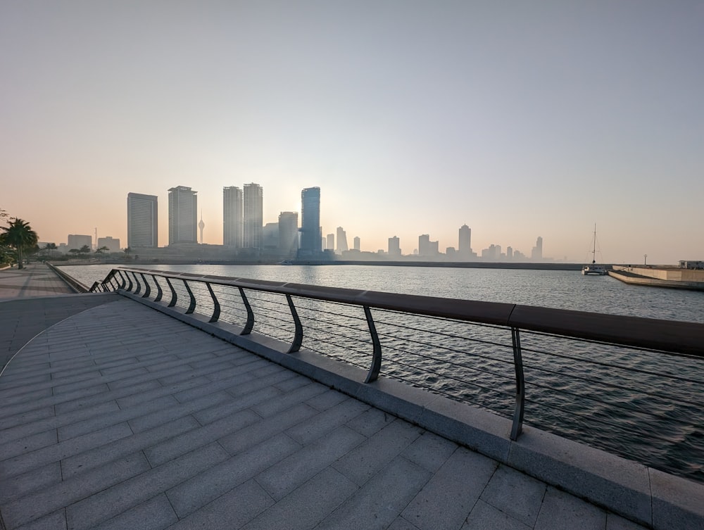 a view of a body of water with a city in the background