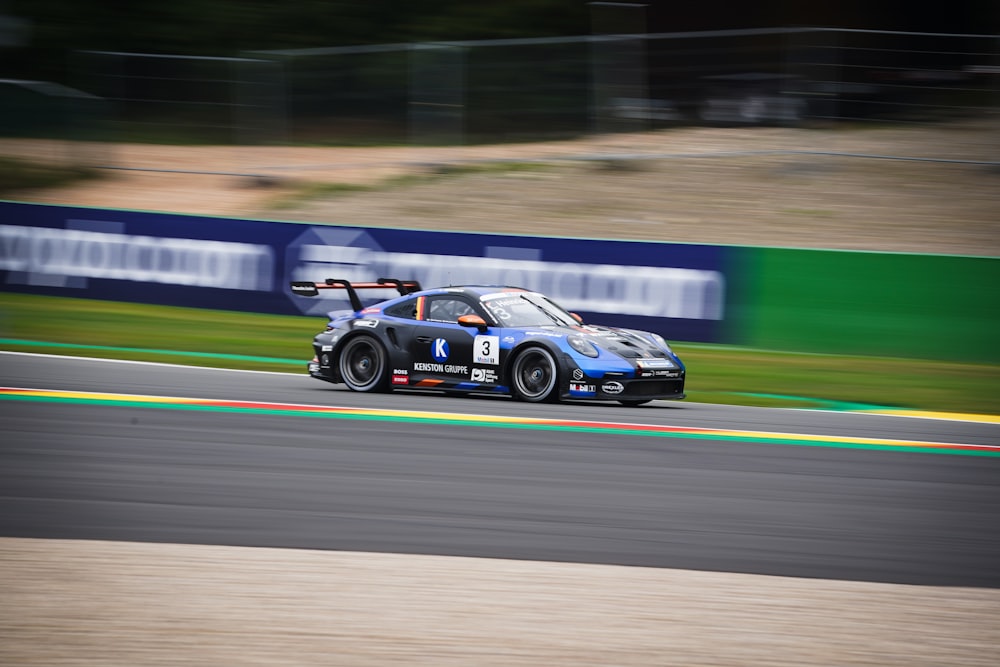 a race car driving down a race track