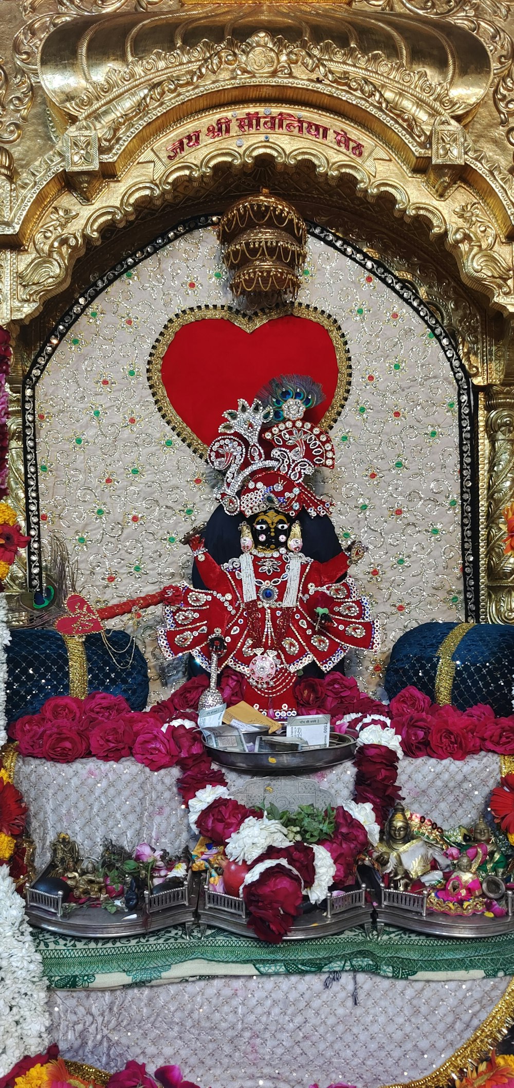 a statue of a hindu god in a temple