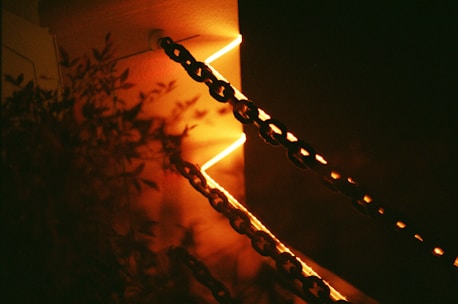 a close up of a chain on a wall
