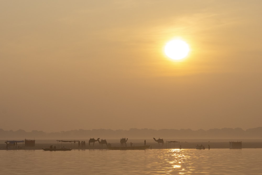 a large body of water with a boat in the middle of it