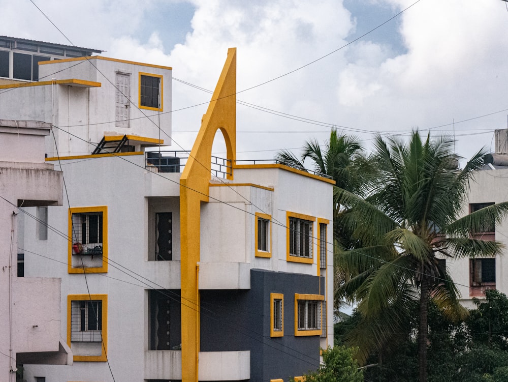 a tall building with a clock on the side of it