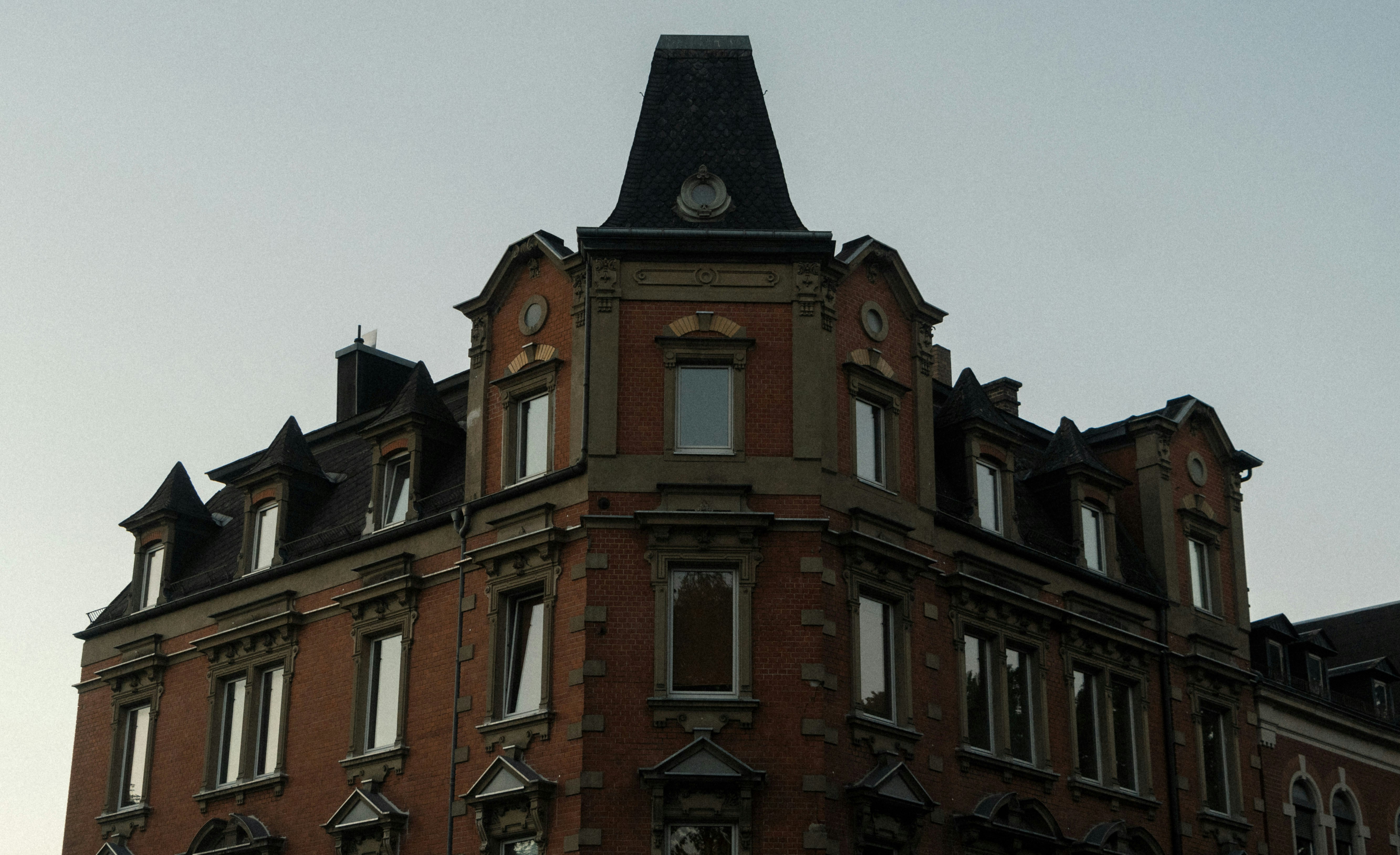 a large building with a clock on the top of it