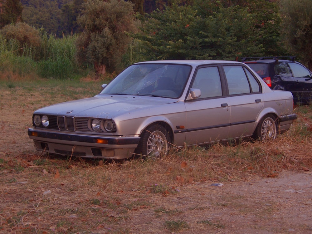 a car that is sitting in the grass