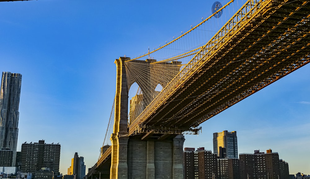 a view of the brooklyn bridge from the water