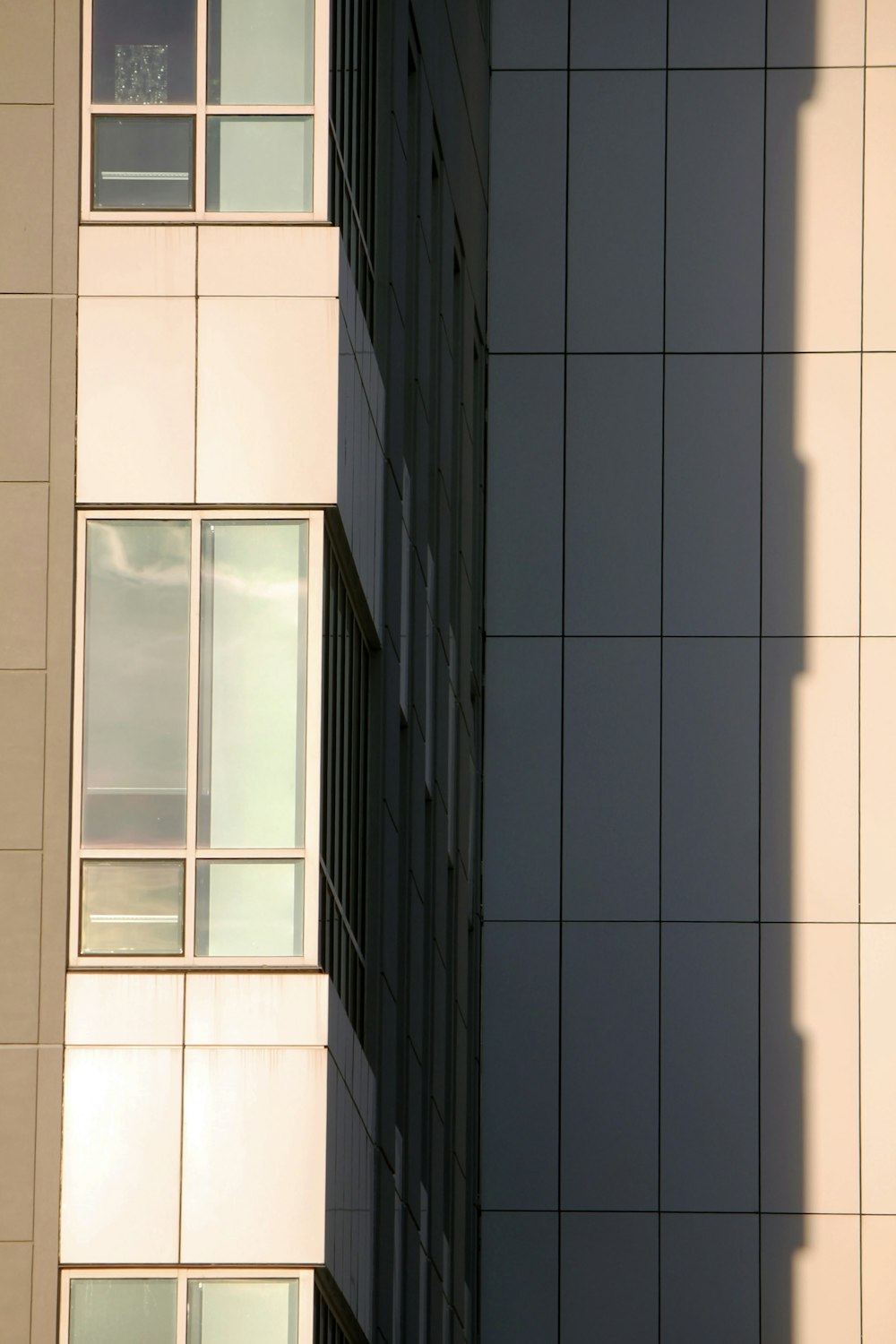 a tall building with a clock on the side of it