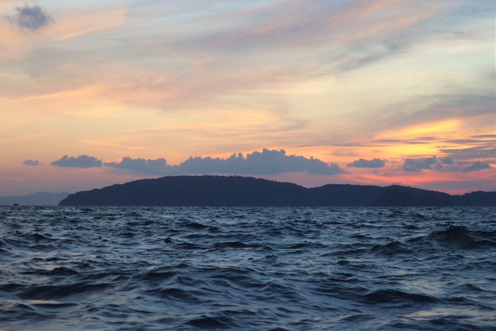 a small island in the middle of a large body of water