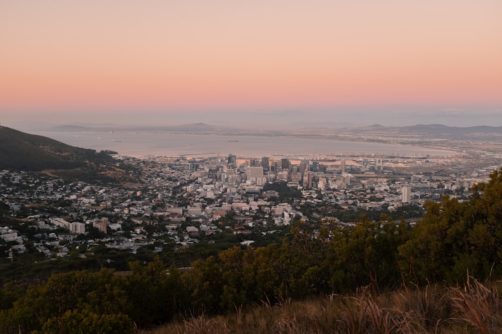 a view of a city from a hill