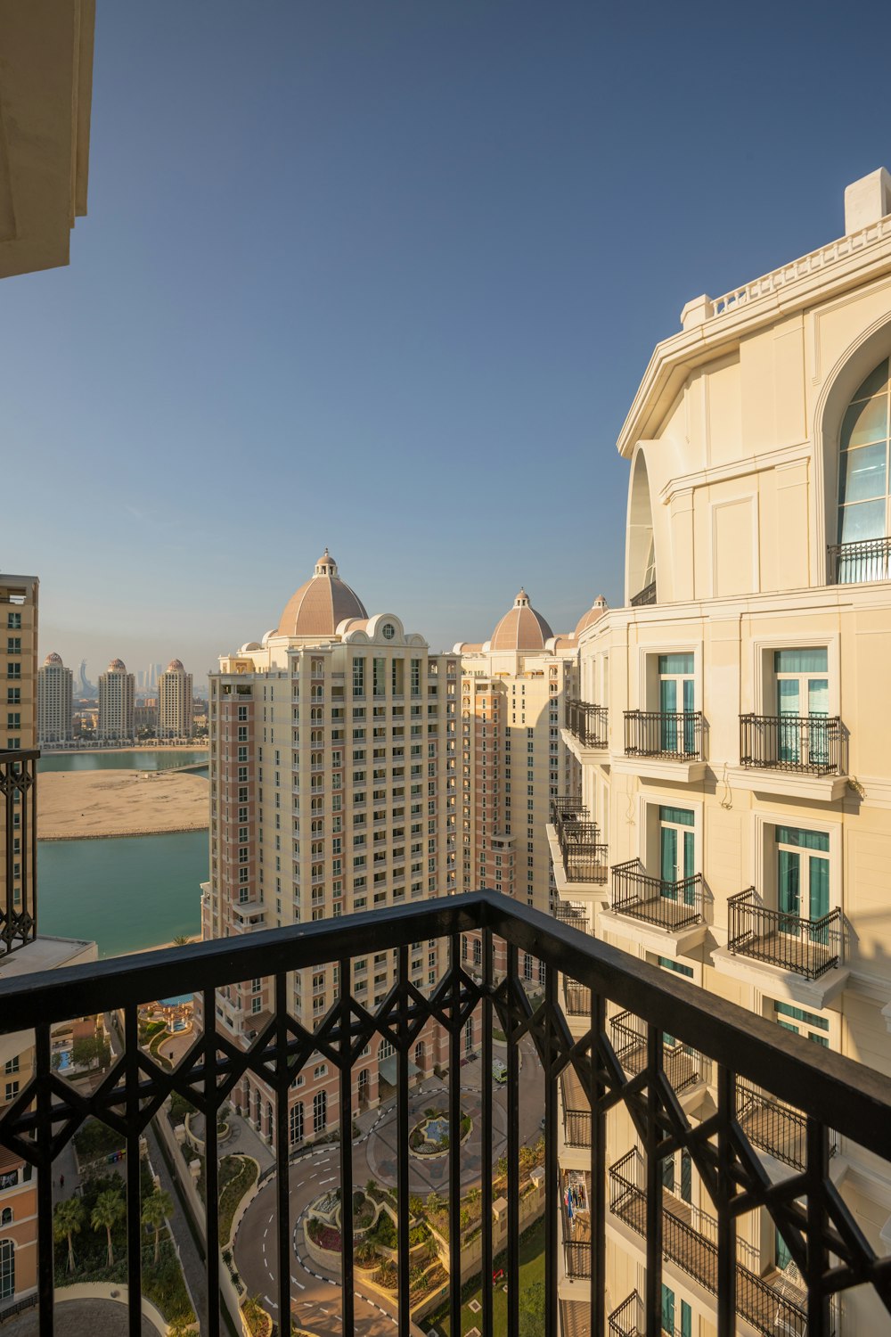 a balcony with a view of a city