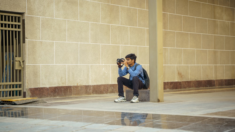 a man taking a picture of himself with a camera