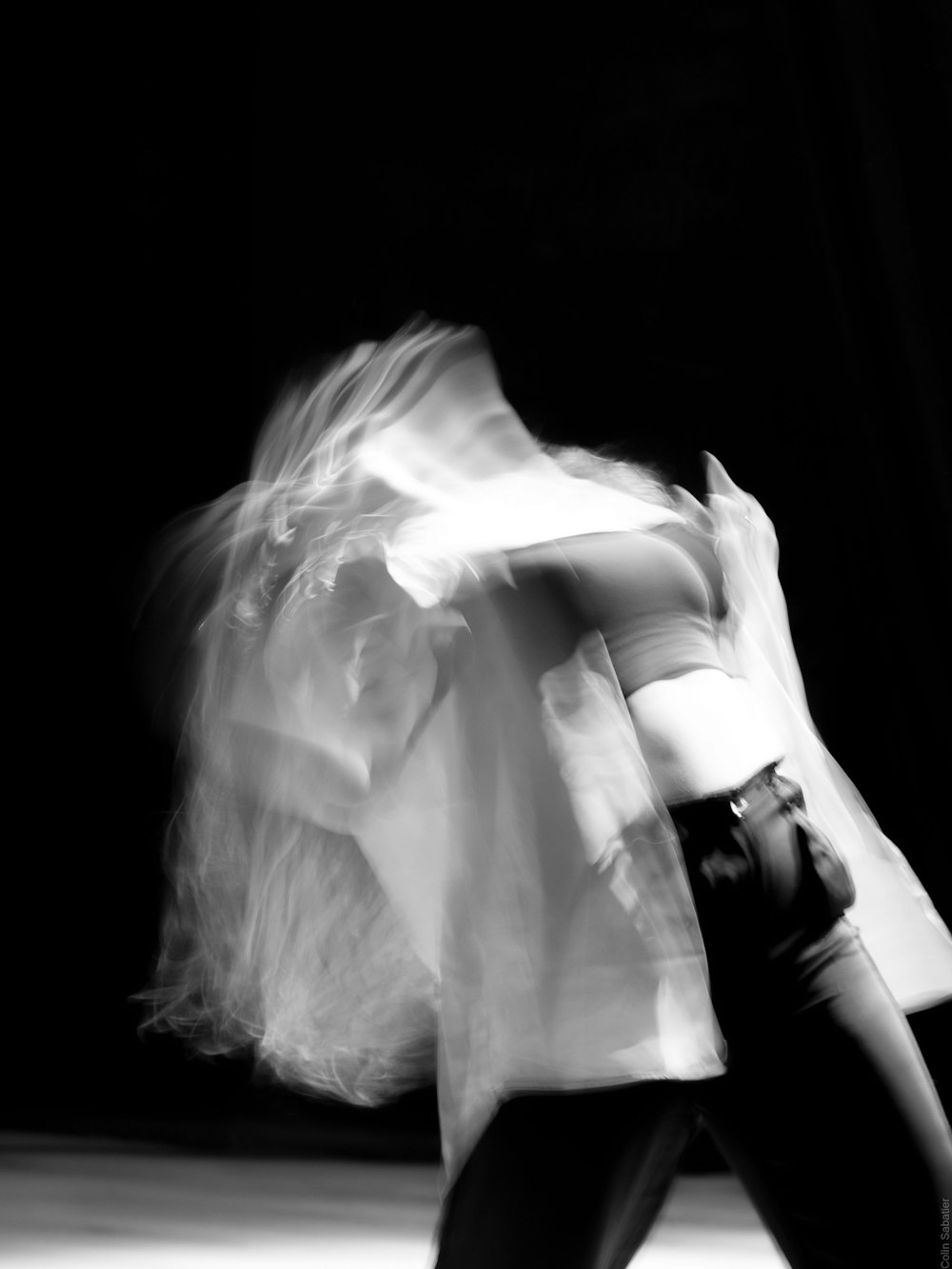 a blurry photo of a woman dancing