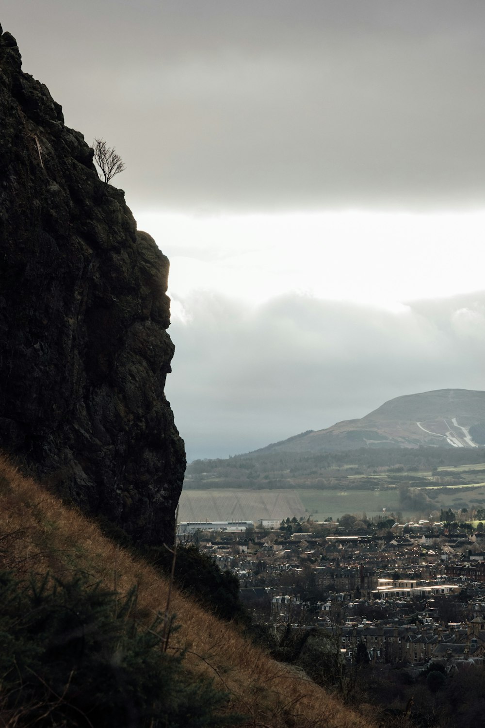 a view of a city from a hill