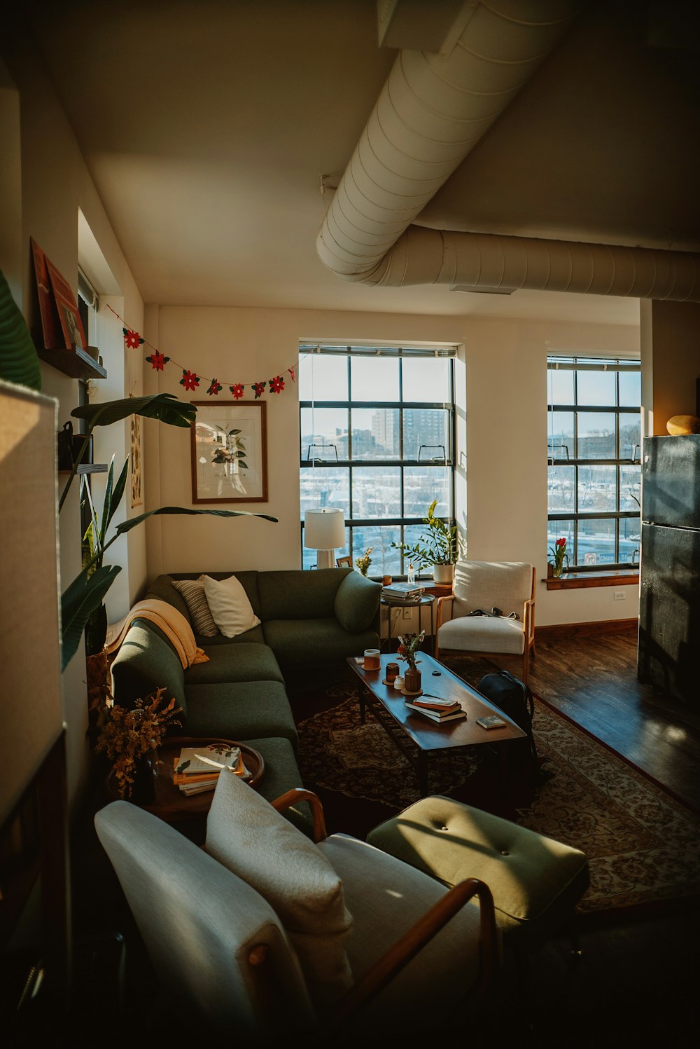 a living room filled with furniture and a fire place