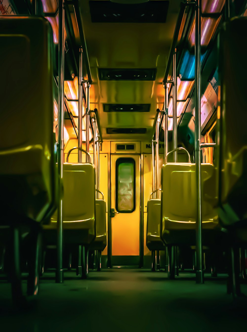 a train car filled with lots of yellow seats