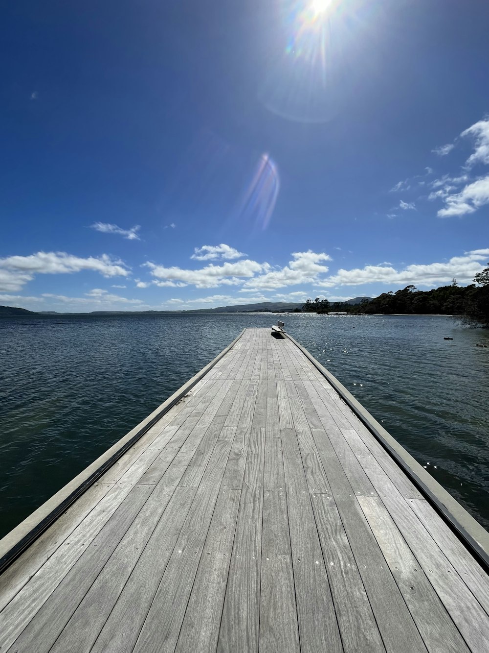 a long wooden pier extending into the water