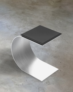 a metal object with a book on top of it