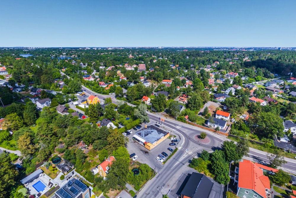 an aerial view of a city with lots of trees