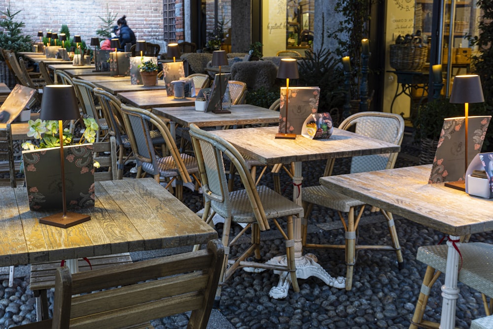 a row of wooden tables sitting next to each other