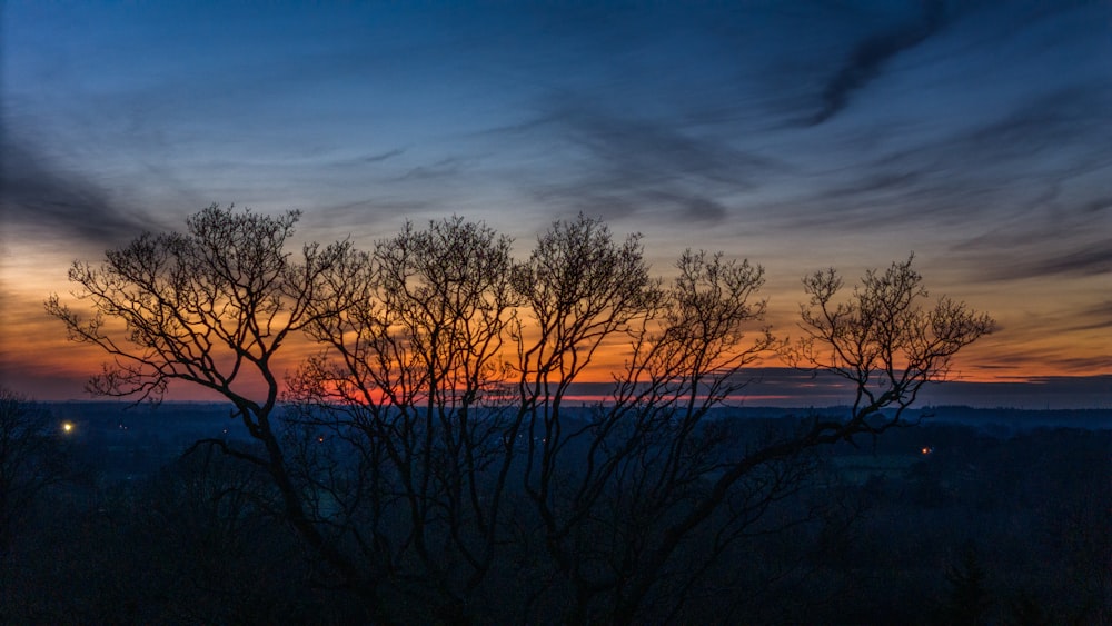 a view of a sunset from a hill top