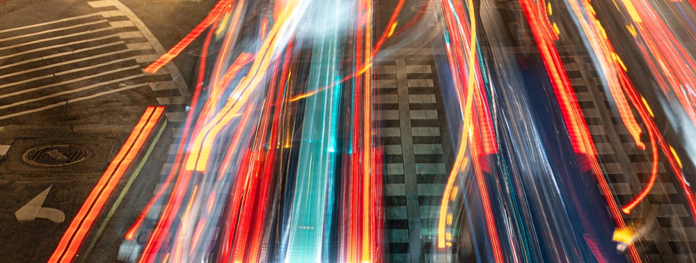 a blurry photo of a city street at night