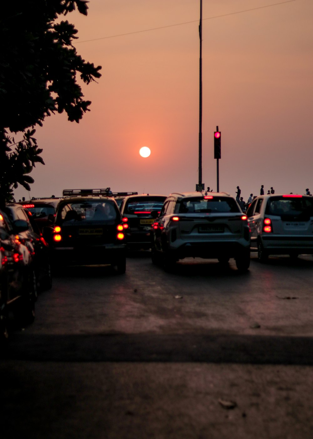 a parking lot filled with lots of parked cars