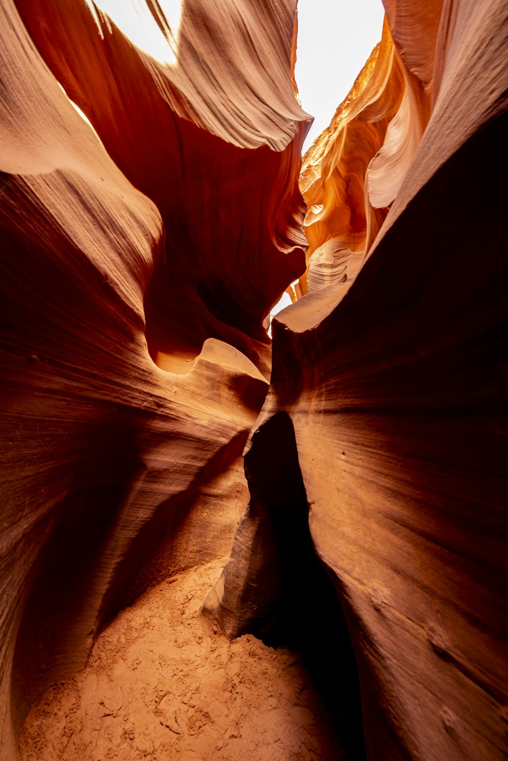 a narrow slot in the side of a canyon