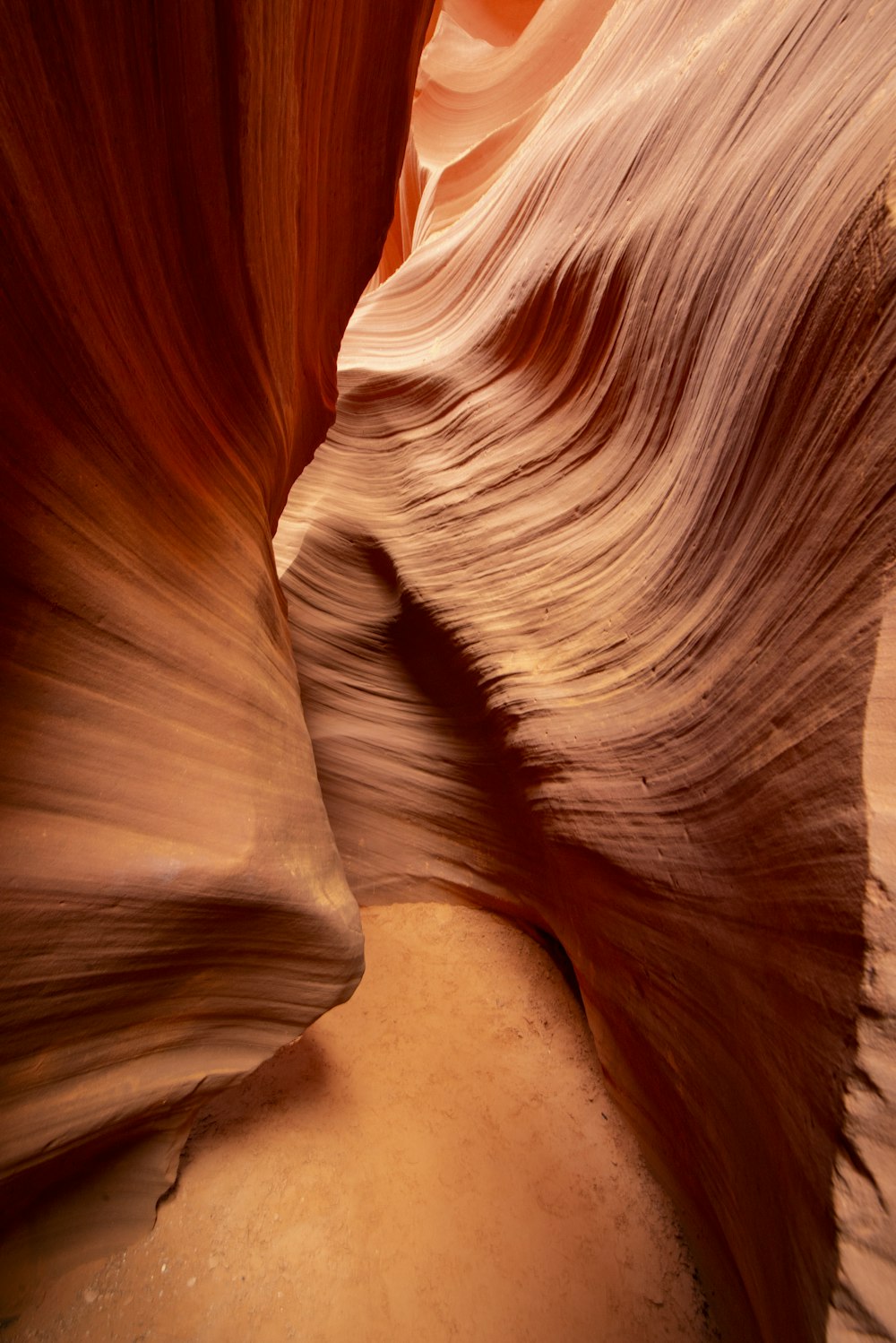 a narrow slot in the side of a canyon