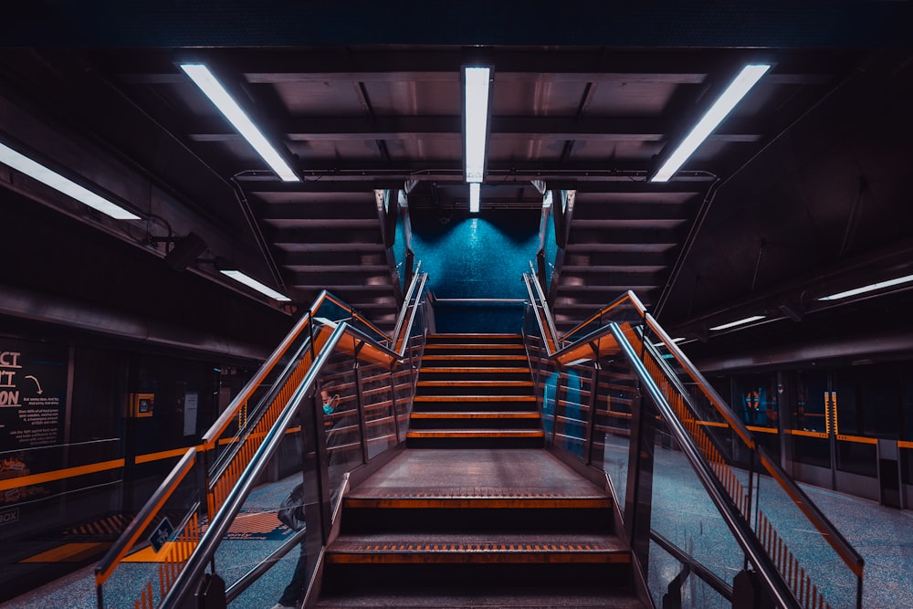 a set of stairs leading up to the top of a flight of stairs