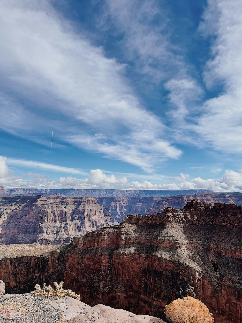 a view of the grand canyon from the edge of a cliff