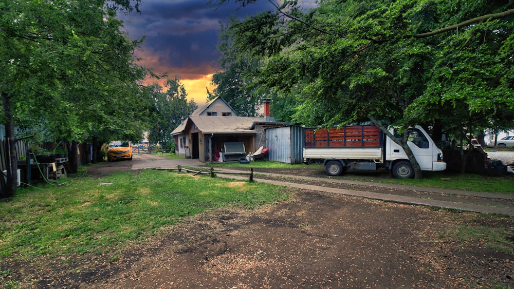 a truck is parked in front of a house