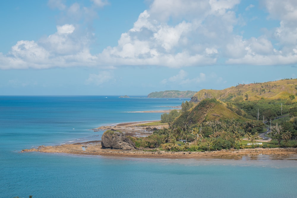 a view of the ocean from a hill