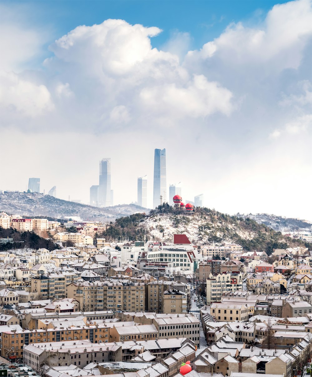 a view of a city from a hill