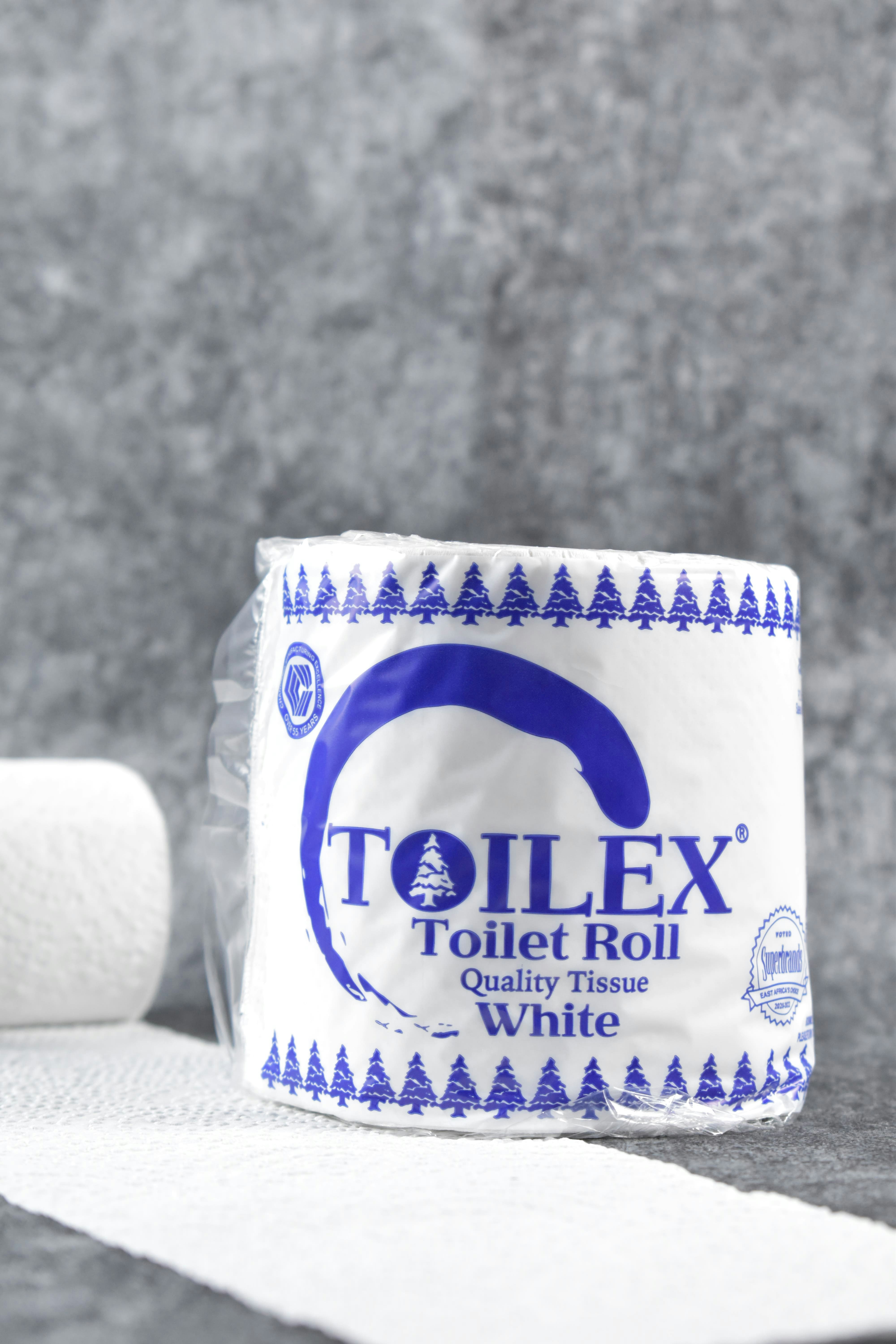 a roll of toilet paper sitting on top of a counter